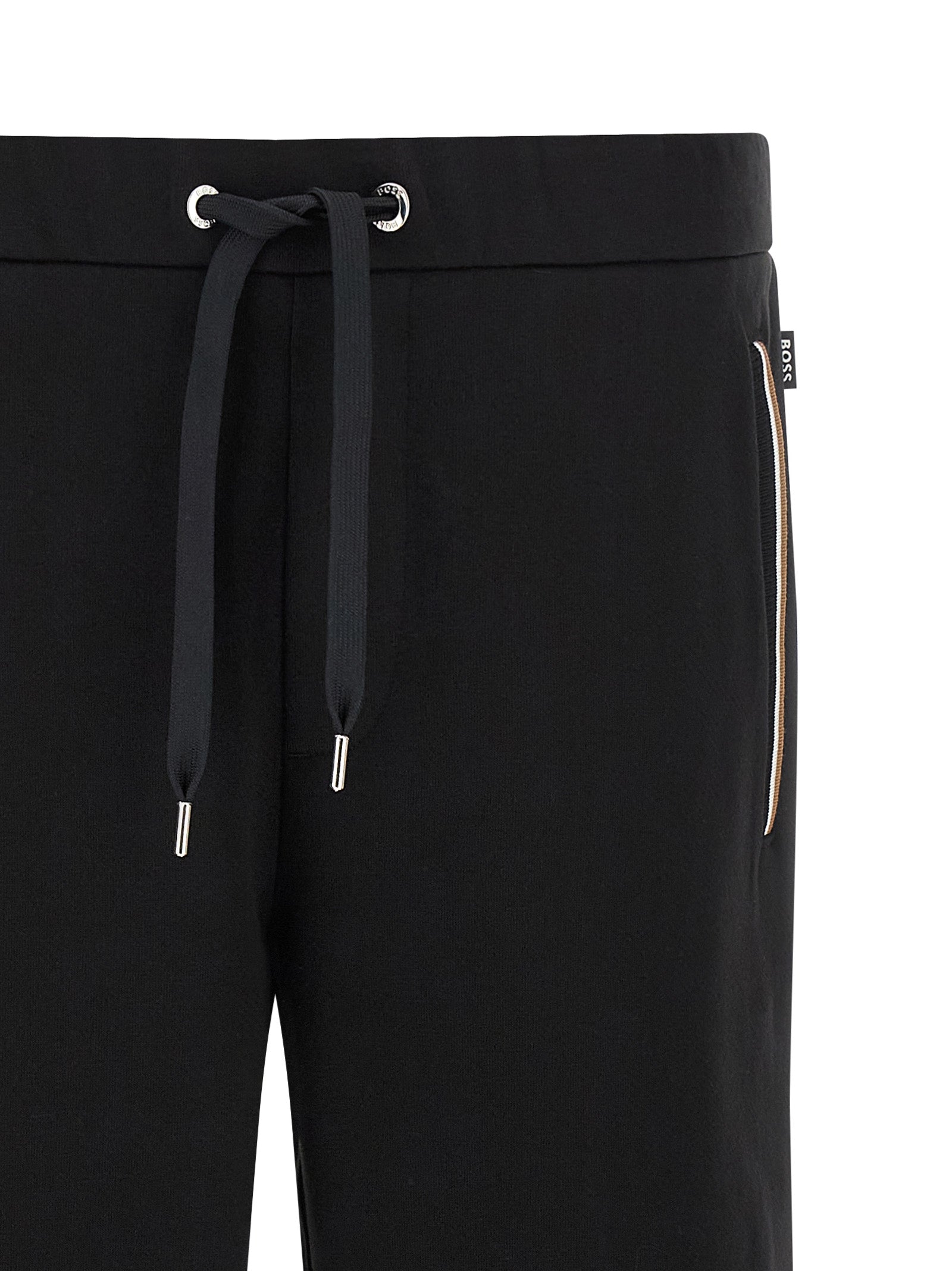 Joggers by Hugo Boss for men in cotton black & striped features an sartorial and long with a cut for a sartorial finish.