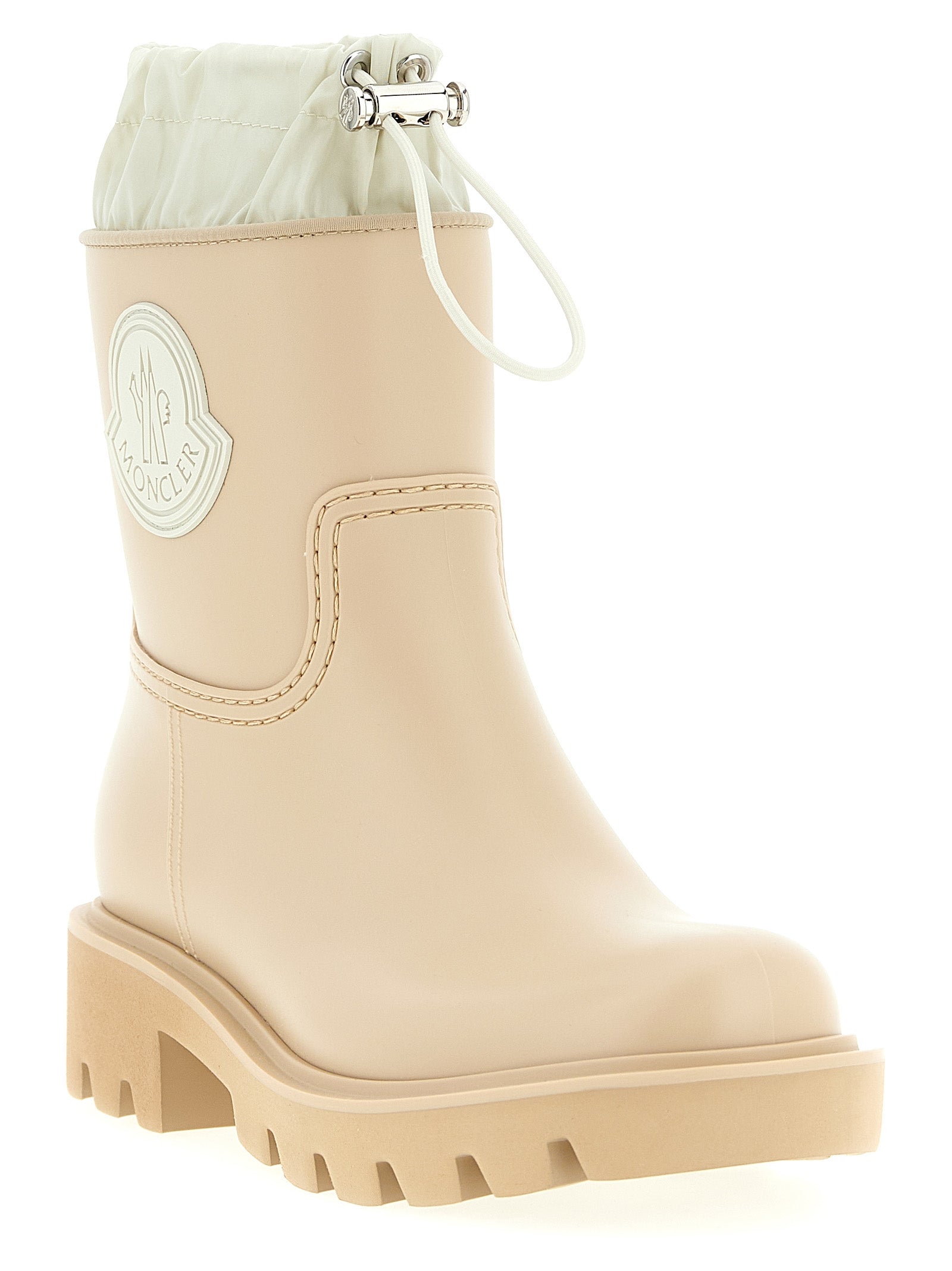 Ankle Rain Boots by Moncler for women in nylon eva & pvc beige showcases a ergonomic silhouette from the Women's Nylon EVA & PVC Ankle Rain Boots collection, featuring a ergonomic and a ergonomic .