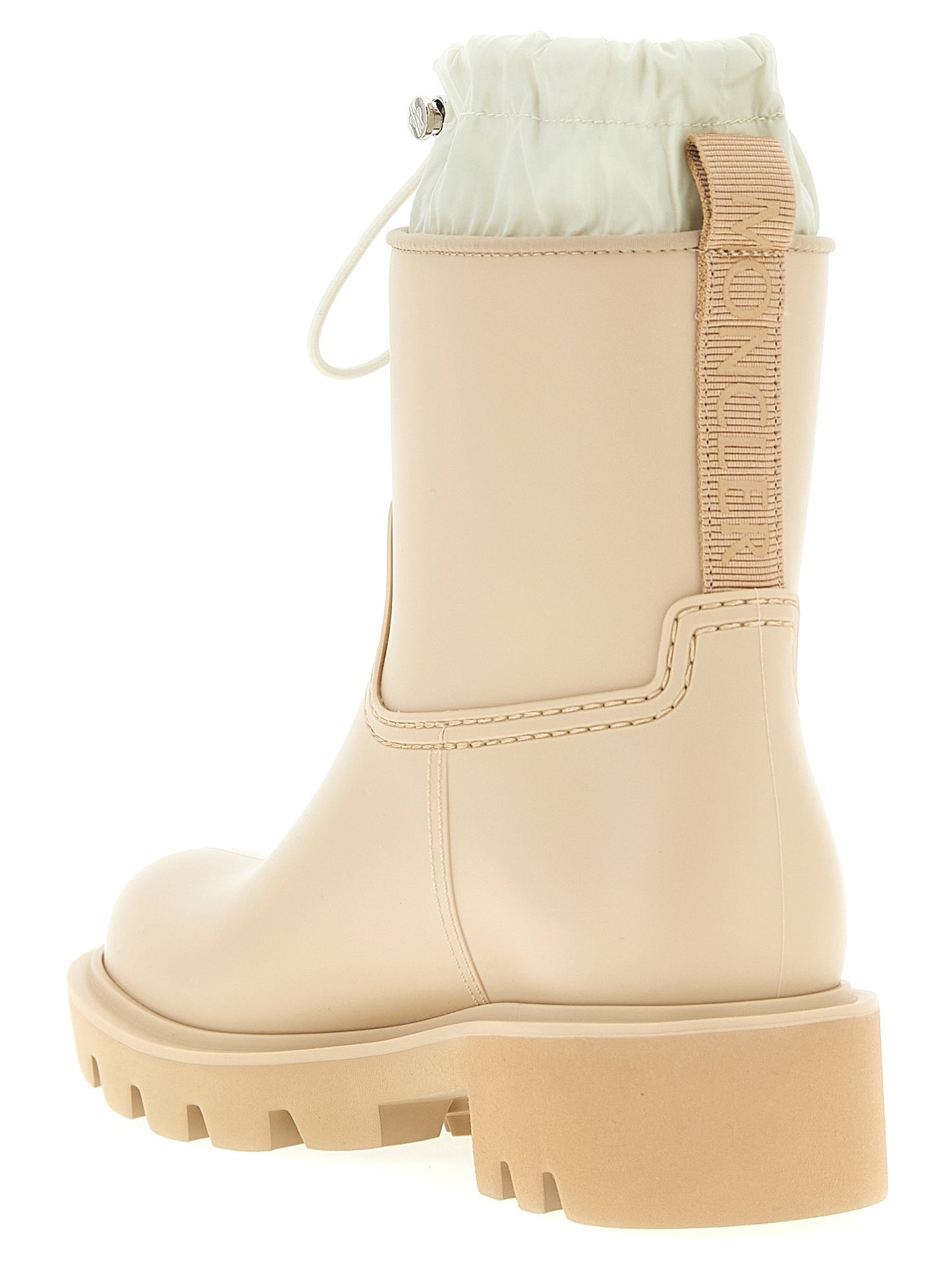 Ankle Rain Boots by Moncler for women in nylon eva & pvc beige features an enchanting design from the Women's Nylon EVA & PVC Ankle Rain Boots collection, highlighting a enchanting and for a refined look.
