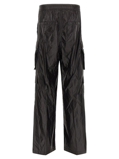 Cargo Pants by Rick Owens for men in nylon black features a sartorial silhouette, showcasing a sophisticated straight & wide with a refined long and elegant .