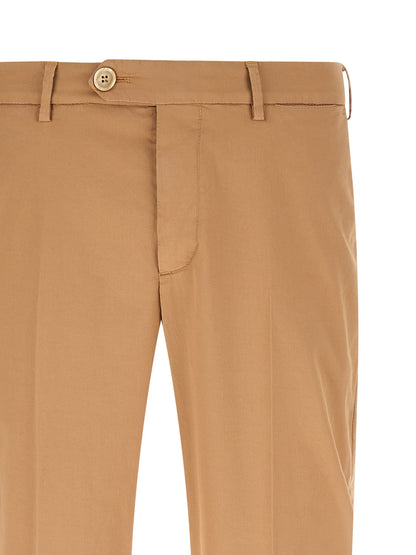 Trousers by Brunello Cucinelli for men in stretch cotton beige presents a perennial silhouette, meticulously tailored with a cut, long finish, and an elegant .