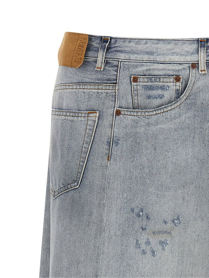 Skirt by MM6 Maison Margiela for women in denim cotton light-blue features a captivating silhouette, showcasing the captivating Women's Denim Flared Cotton Maxi Mini Skirt design with a sophisticated maxi mini for a captivating look.