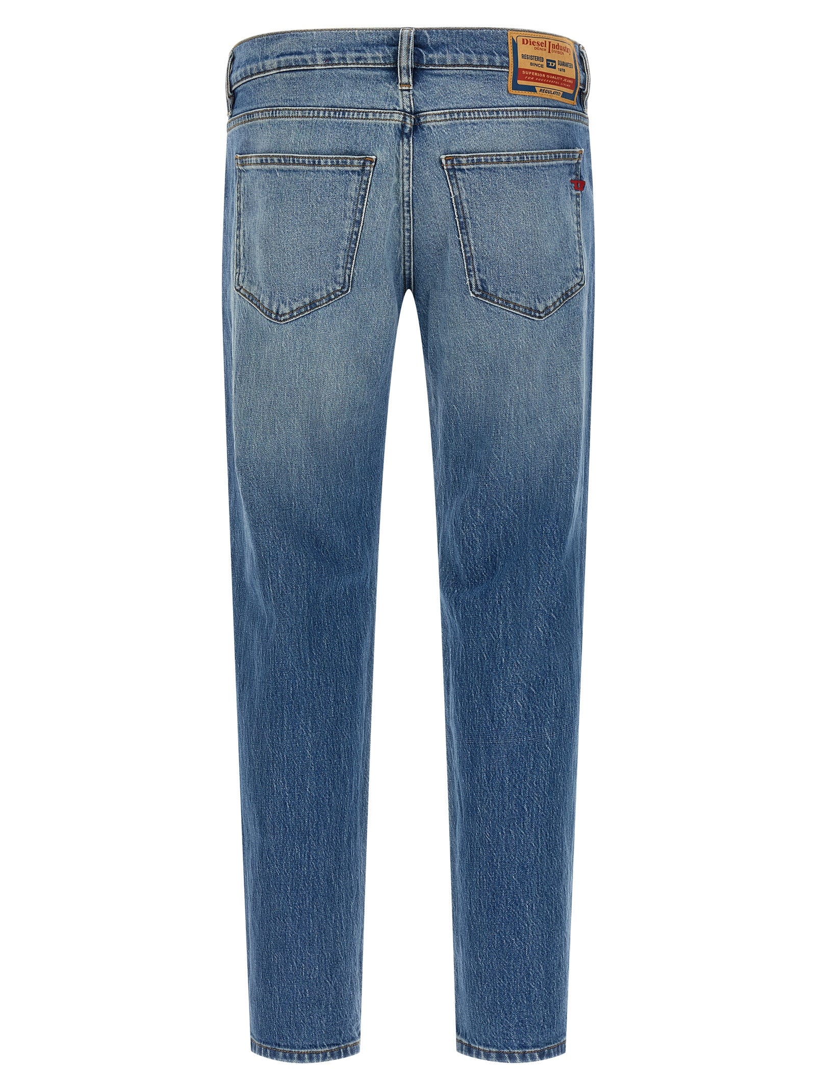 Jeans by Diesel for men in stretch denim cotton light-blue presents a refined pantology silhouette, artfully defined by a refined pantology straight-leg, long, and a sophisticated mid rise.
