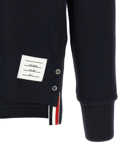 Polo Shirt by Thom Browne for men in cotton blue & signature showcases a sharp silhouette, detailed with a refined and sharp for a sophisticated finish.