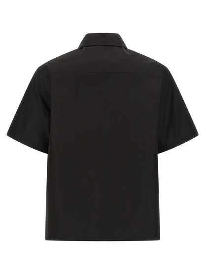 Shirt by Jil Sander for men in cotton black features an polished silhouette, showcasing a sophisticated and detail for a truly polished finish.