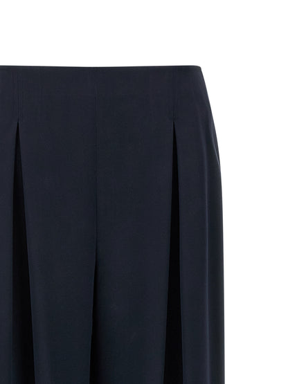 Trousers by Max Mara for women in silk blue presents a perennial silhouette, meticulously tailored with a straight-leg & wide cut, long finish, and an elegant .