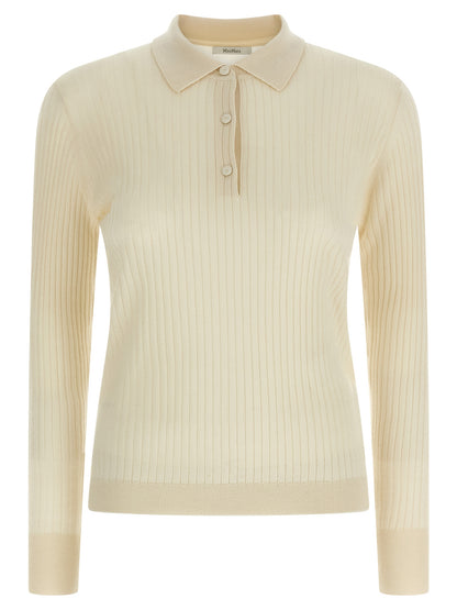 Polo Shirt by Max Mara for women in cashmere silk white & patterned presents a crisp silhouette, artfully detailed with a crisp and crisp .