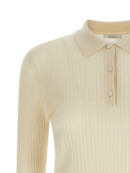 Polo Shirt by Max Mara for women in cashmere silk white & patterned showcases a sharp silhouette, detailed with a refined and sharp for a sophisticated finish.