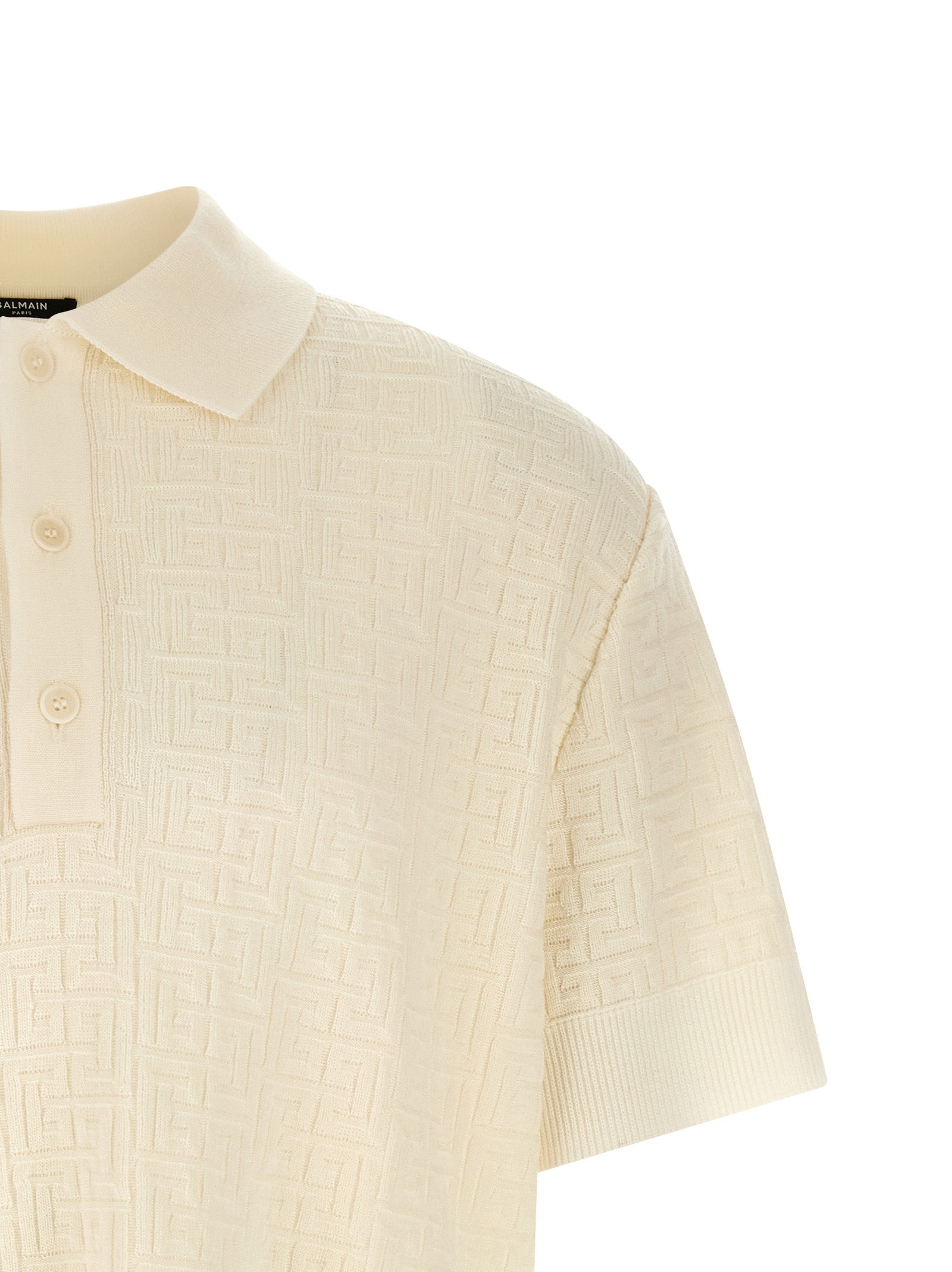 Polo Shirt by Balmain for men in polyamide linen & wool white, jacquard & monogram showcases a enviable silhouette, featuring a refined and for a enviable finish.