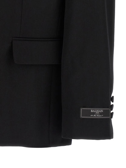 Blazer by Balmain for men in virgin wool & crystal black features an sartorial silhouette, showcasing a sophisticated and sartorial for a truly sartorial finish.