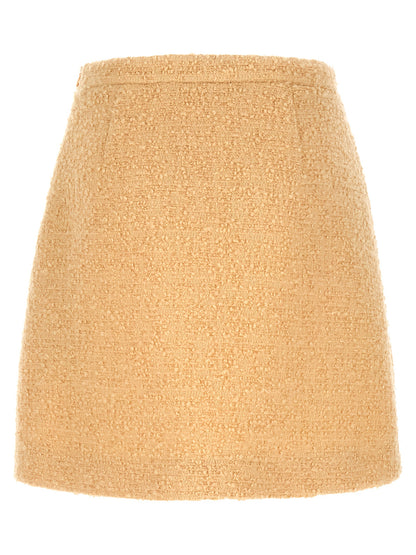 Skirt by Valentino Garavani for women in polyamide silk virgin wool tweed beige, gold & striped features an relaxed-yet-refined silhouette that elegantly showcases the V Logo Women's Polyamide Silk Virgin Wool Tweed Mini Long Skirt design and sophisticated mini long.