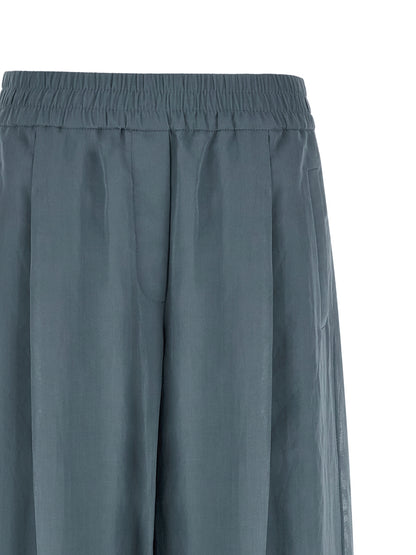 Casual Pants by Brunello Cucinelli for women in cotton blue features a refined silhouette with a refined wide, defined by a high rise and a refined long for a refined finish.