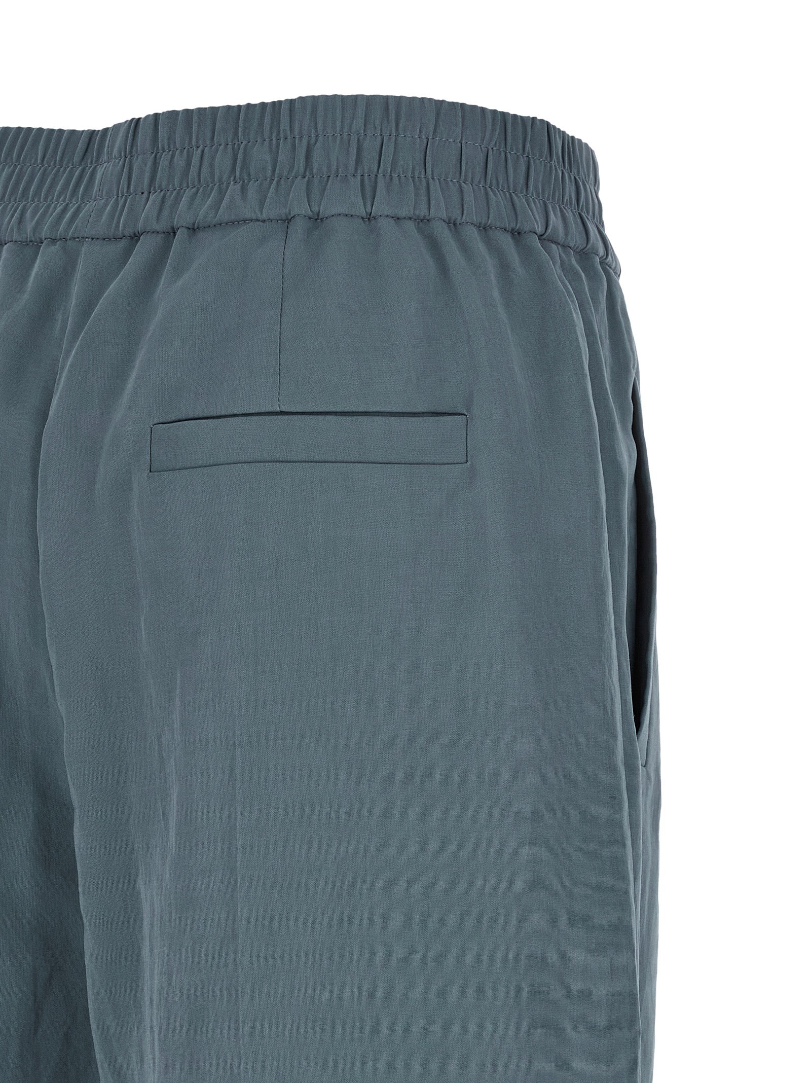Casual Pants by Brunello Cucinelli for women in cotton blue presents a refined pantology silhouette, artfully defined by a refined pantology wide, long, and a sophisticated high rise.