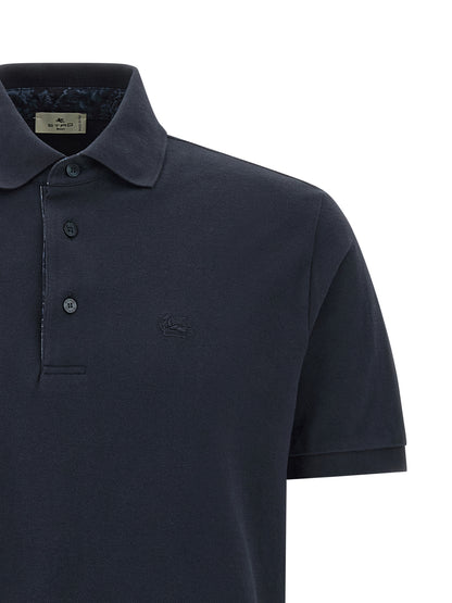 This Polo Shirt by Etro for men in cotton blue, floral & print presents a flawless silhouette, showcasing flawless detailing and a refined for a truly flawless aesthetic.