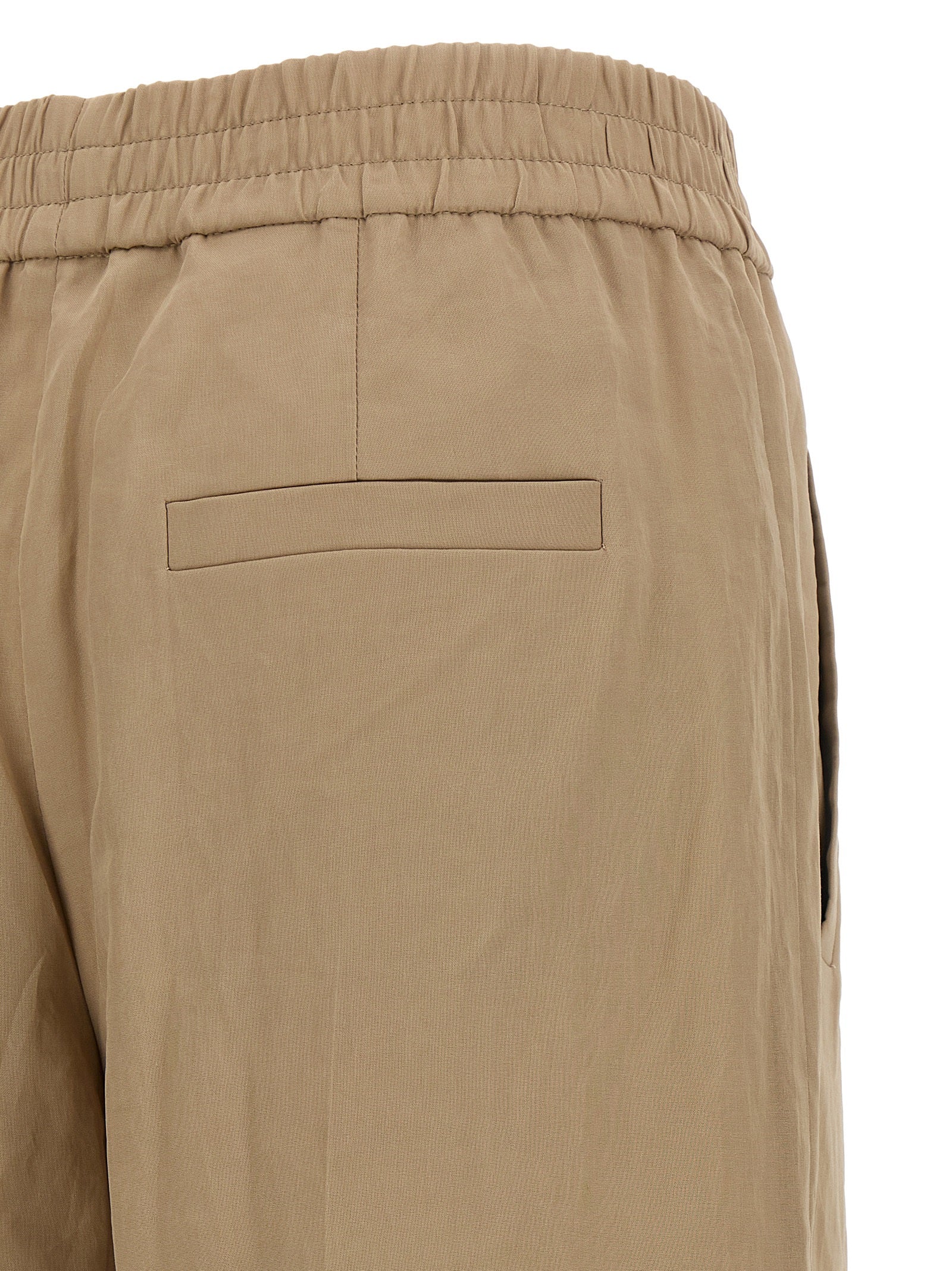 Casual Pants by Brunello Cucinelli for women in cotton & silk beige features an refined tailoring silhouette, showcasing a premium wide with a and long cut for a refined tailoring look.