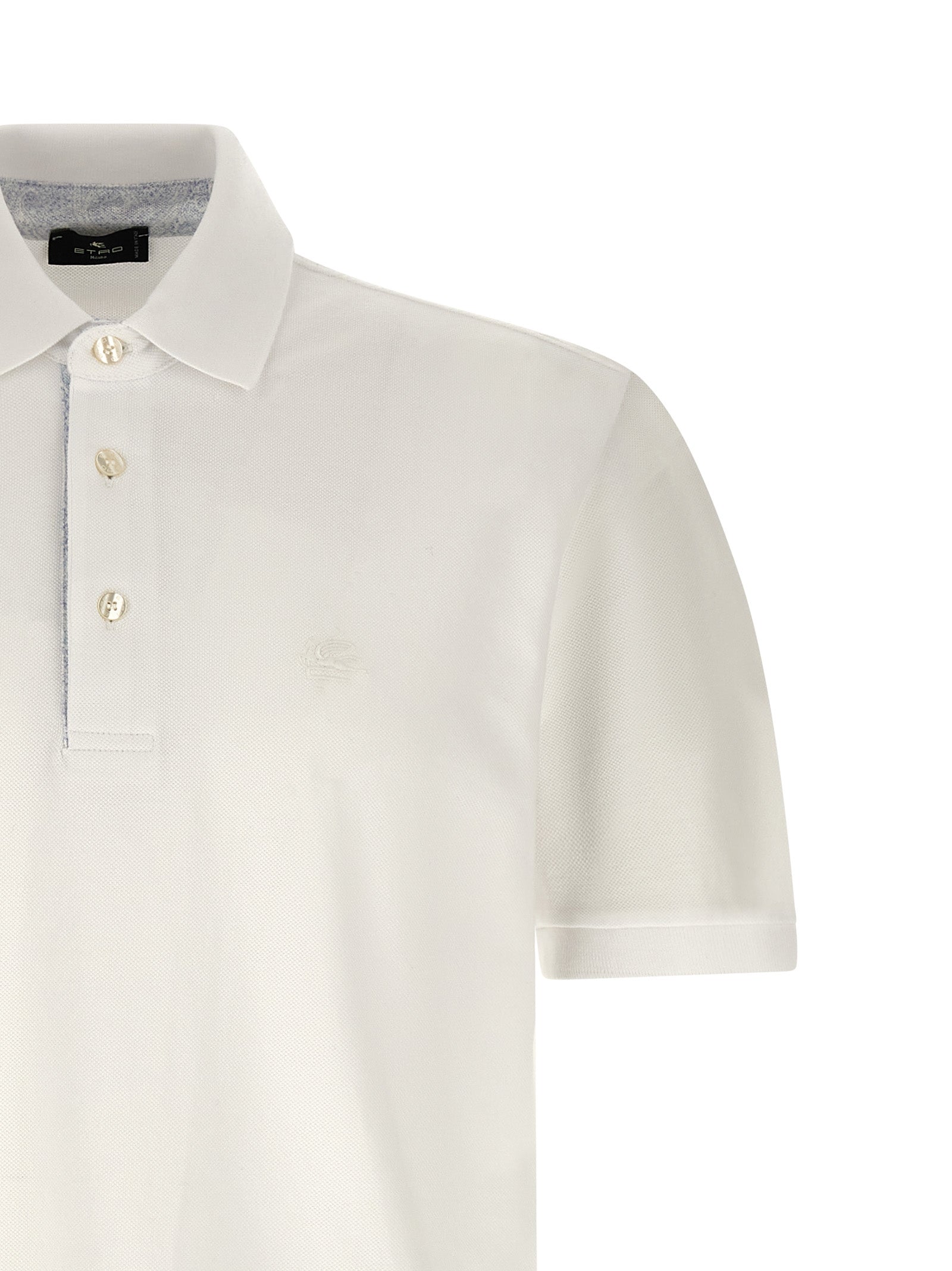 This Polo Shirt by Etro for men in cotton white, floral & print presents a flawless silhouette, showcasing flawless detailing and a refined for a truly flawless aesthetic.