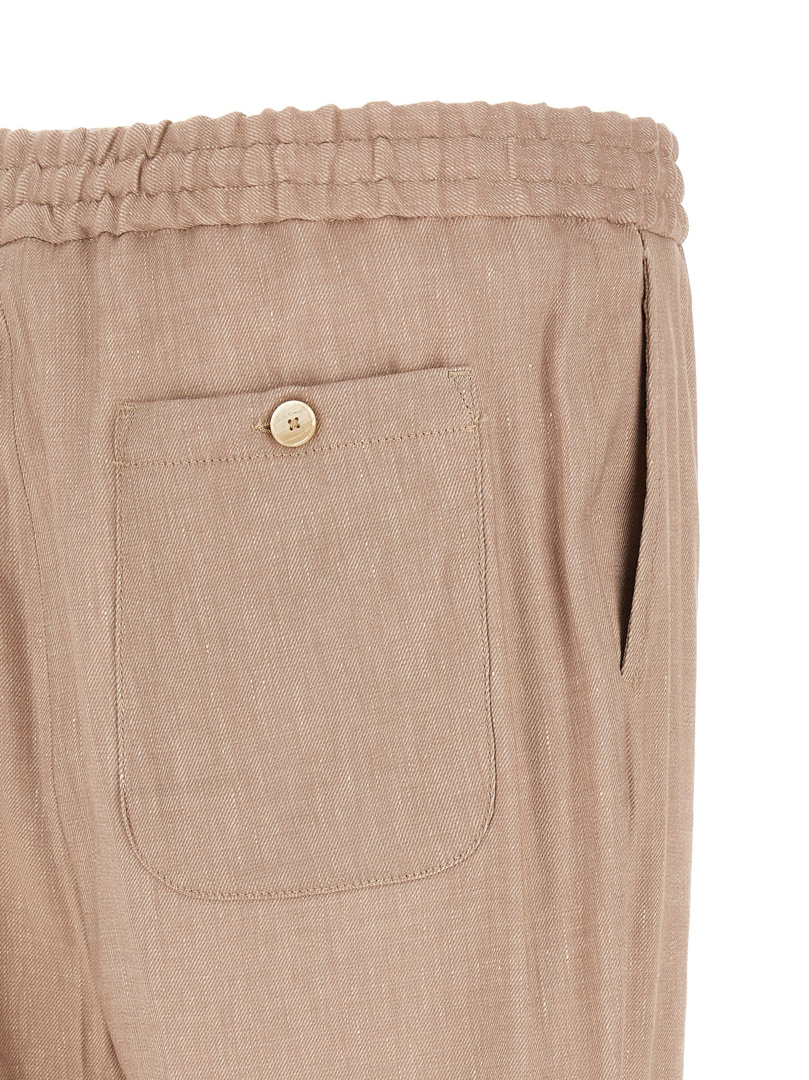 Joggers by Etro for men in linen viscose twill beige presents a refined pantology silhouette, artfully defined by a refined pantology straight-leg, long, and a sophisticated .