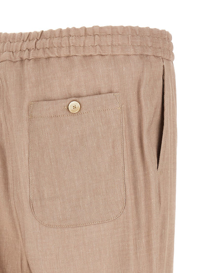 Joggers by Etro for men in linen viscose twill beige presents a refined pantology silhouette, artfully defined by a refined pantology straight-leg, long, and a sophisticated .