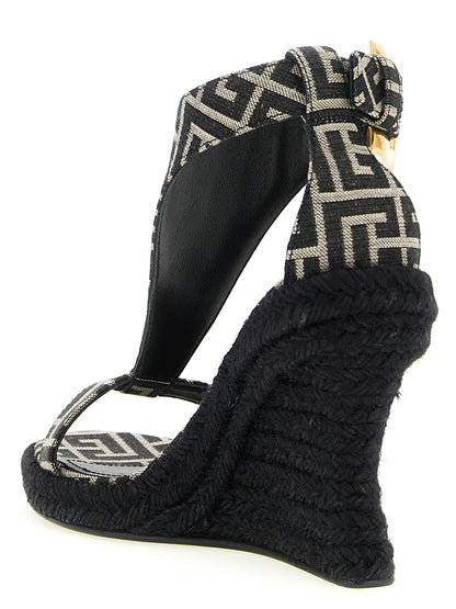 Wedge Ankle Strap Sandals by Balmain for women in polyester leather & cotton black, jacquard, signature & monogram presents a sculptural silhouette, showcasing the Anthem Women's Polyester Leather & Cotton Wedge Ankle Strap Sandals design with a sculptural wedge and for a premium look.