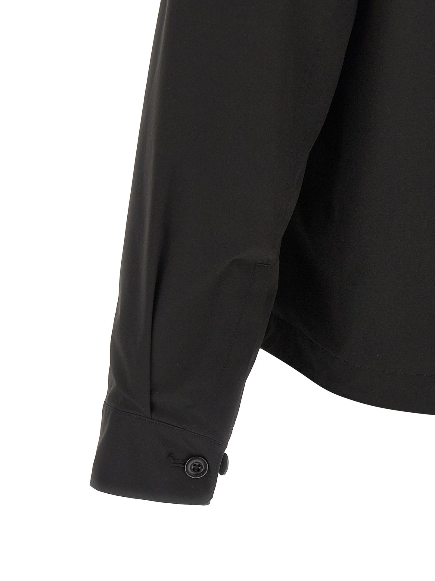 Overshirt by C.P. Company for men in polyester black showcases a sharp silhouette, elegantly detailed with a sharp and sharp .