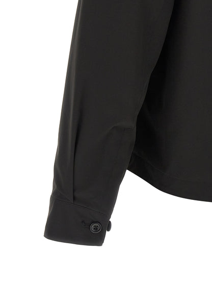 Overshirt by C.P. Company for men in polyester black showcases a sharp silhouette, elegantly detailed with a sharp and sharp .