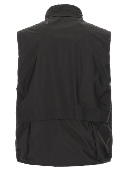 Vest by C.P. Company for men in polyamide black features a chic silhouette, expertly detailed with a refined and premium breathable-design, water-resistant, pockets & insulated for a truly chic look.