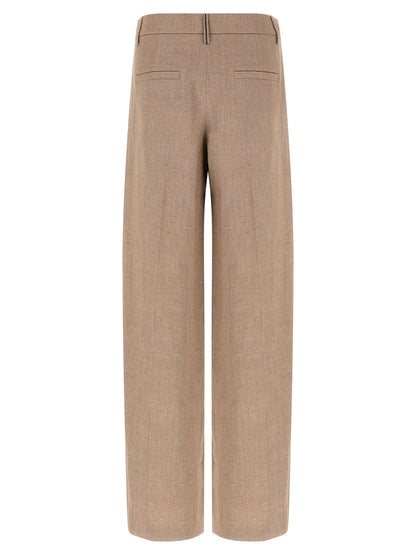 Trousers by Brunello Cucinelli for women in polyamide metallized fiber twill multicolor, pink & signature features an on trend silhouette, showcasing a sophisticated flared & wide with a long and for an on trend finish.