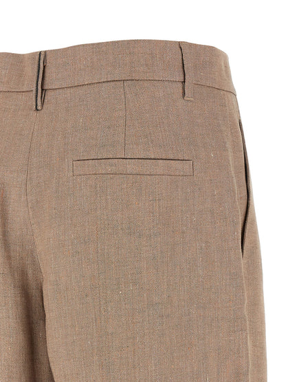 Trousers by Brunello Cucinelli for women in polyamide metallized fiber twill multicolor, pink & signature features a tailored silhouette with a tailored flared & wide, defined by its long and a sophisticated .
