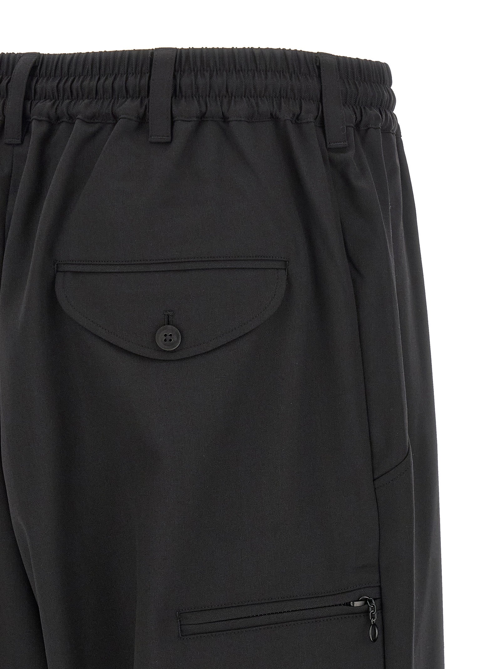 Casual Pants by Y-3 for men in polyester & wool black presents a tailored silhouette, showcasing a tailored wide and long cut with a refined for a truly tailored aesthetic.