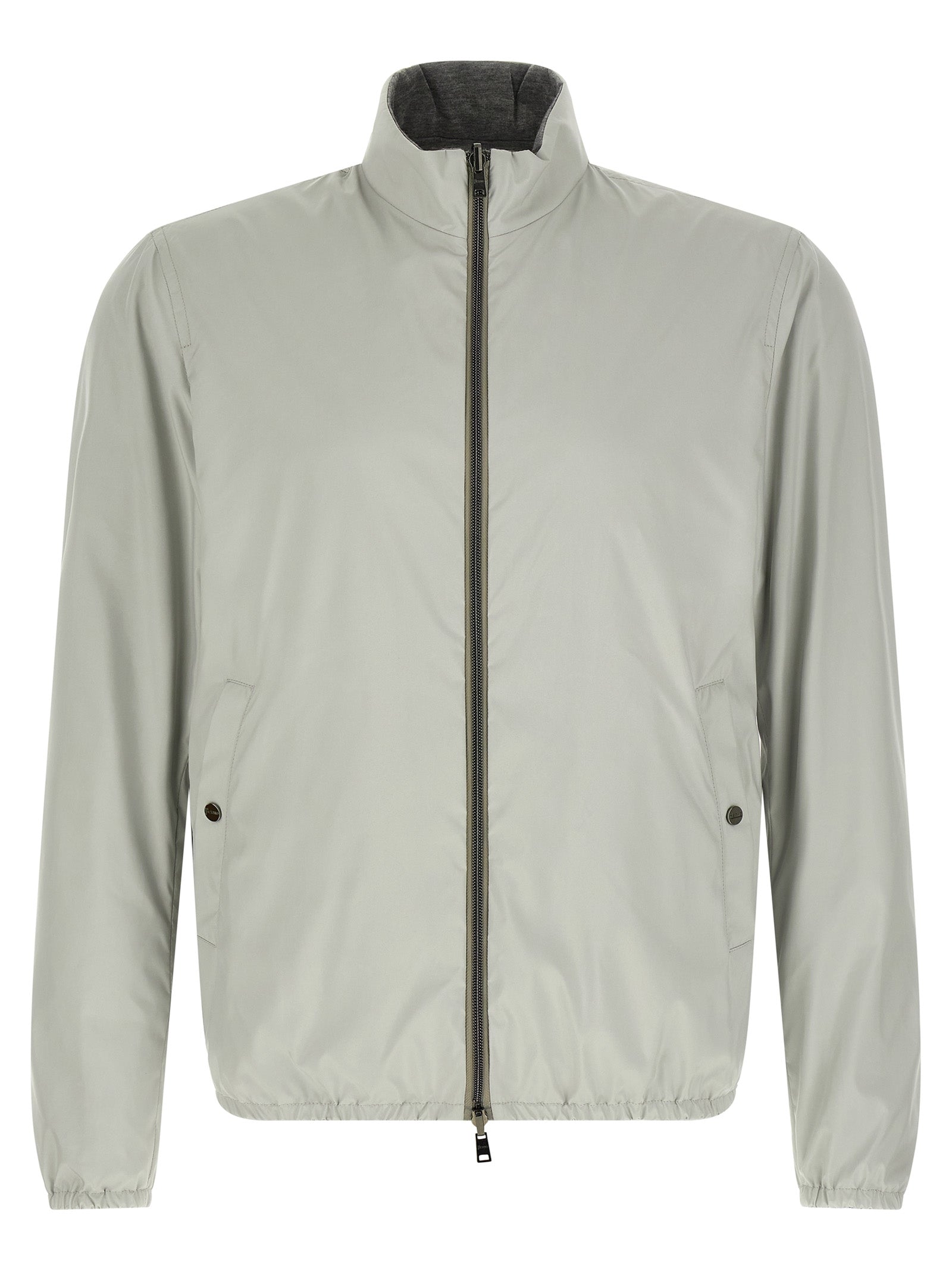This Bomber Jacket by Herno for men in polyester & viscose multicolor exhibits a edgy silhouette, meticulously detailed with functional pockets and a edgy high-neck neckline for a edgy finish.