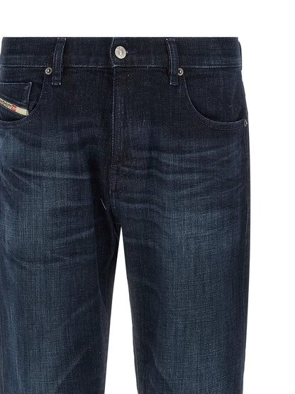 Jeans by Diesel for men in stretch denim cotton blue features an refined tailoring silhouette, showcasing a premium straight-leg with a mid rise and long cut for a refined tailoring look.
