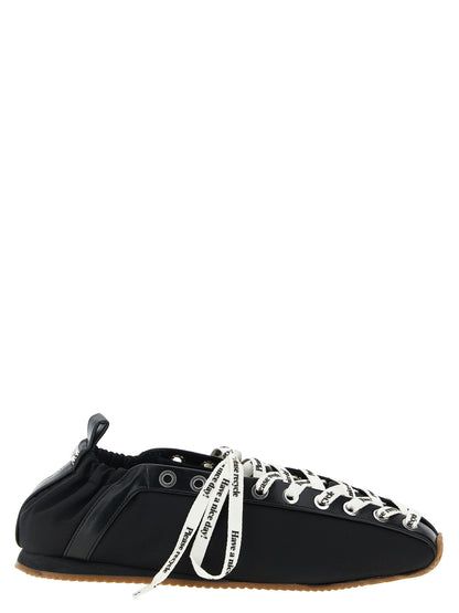 Ballet Flat Shoes by Ganni for women in nylon polyamide polyurethane leather black presents a impeccable silhouette as Women's Nylon Polyamide Polyurethane Leather Ballet Flat Shoes, artfully designed with a and a impeccable square toe style for a refined, upscale finish.