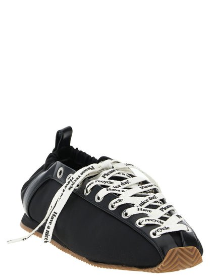 Ballet Flat Shoes by Ganni for women in nylon polyamide polyurethane leather black features an statuesque silhouette from the Women's Nylon Polyamide Polyurethane Leather Ballet Flat Shoes collection, showcasing a and a statuesque square toe style for a statuesque look.
