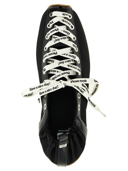 Ballet Flat Shoes by Ganni for women in nylon polyamide polyurethane leather black features an captivating silhouette, showcasing the captivating style of the Women's Nylon Polyamide Polyurethane Leather Ballet Flat Shoes with its distinct and refined square toe style.