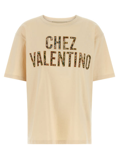 T-Shirt by Valentino Garavani for women in cotton beige, patterned & jacquard features an edgy silhouette, meticulously detailed with a sophisticated and crew neckline for a truly edgy finish.