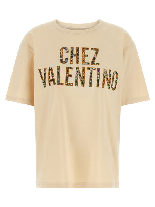 T-Shirt by Valentino Garavani for women in cotton beige, patterned & jacquard features an edgy silhouette, meticulously detailed with a sophisticated and crew neckline for a truly edgy finish.