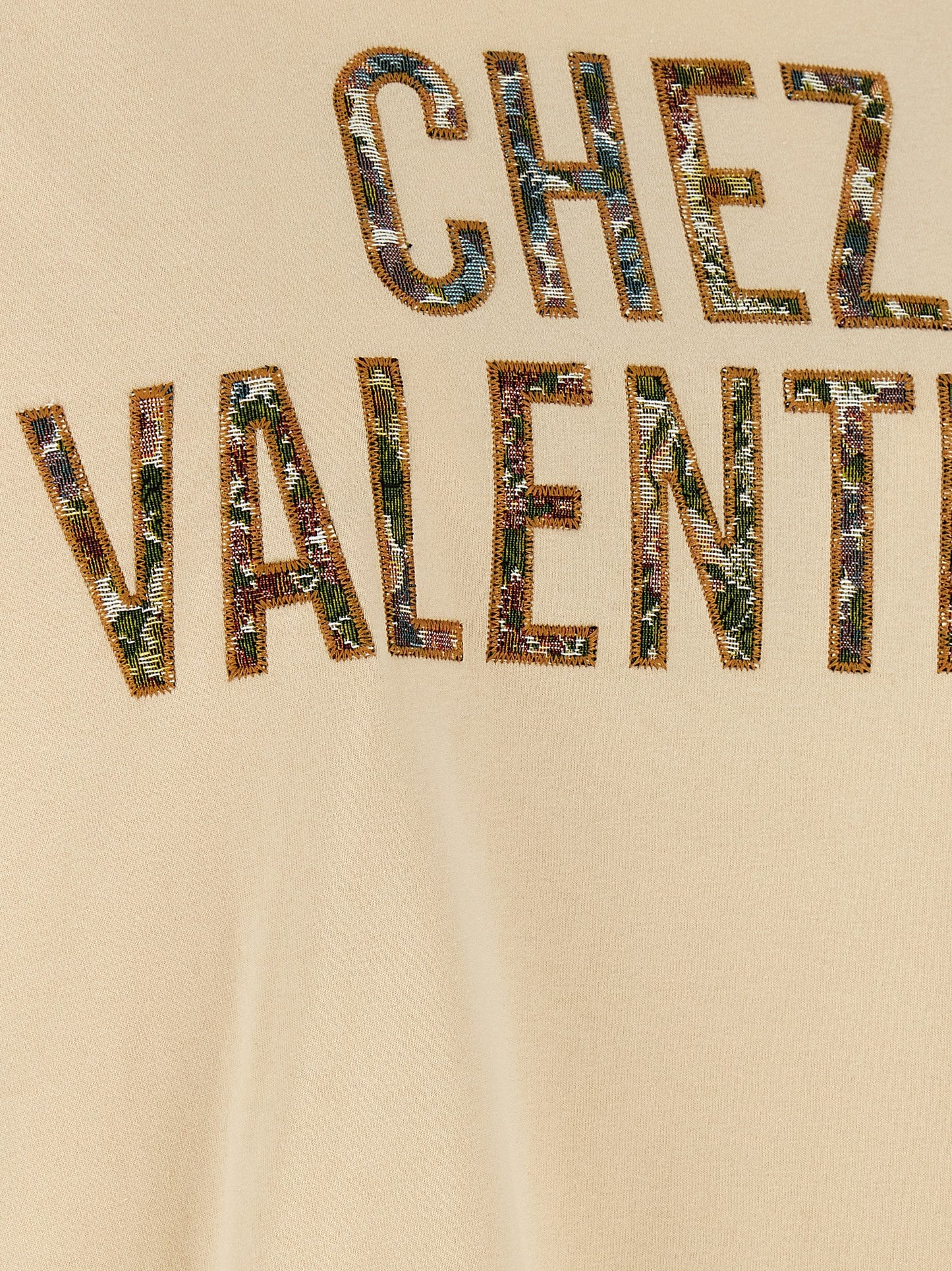 T-Shirt by Valentino Garavani for women in cotton beige, patterned & jacquard showcases a fashionable silhouette, elegantly detailed with a fashionable and for a sophisticated, high-fashion look.