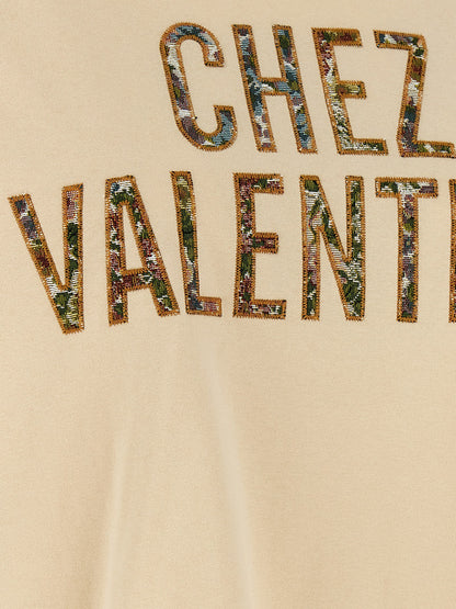 T-Shirt by Valentino Garavani for women in cotton beige, patterned & jacquard showcases a fashionable silhouette, elegantly detailed with a fashionable and for a sophisticated, high-fashion look.