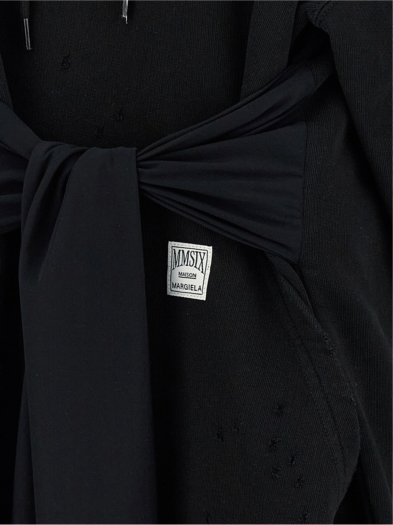 Hooded Dress by MM6 Maison Margiela for women in cotton black & white features an magnificent silhouette, artfully detailed with a magnificent and that flows into an magnificent short mini.