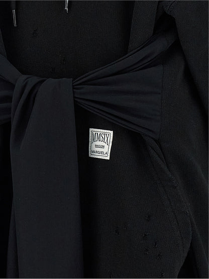 Hooded Dress by MM6 Maison Margiela for women in cotton black & white features an magnificent silhouette, artfully detailed with a magnificent and that flows into an magnificent short mini.