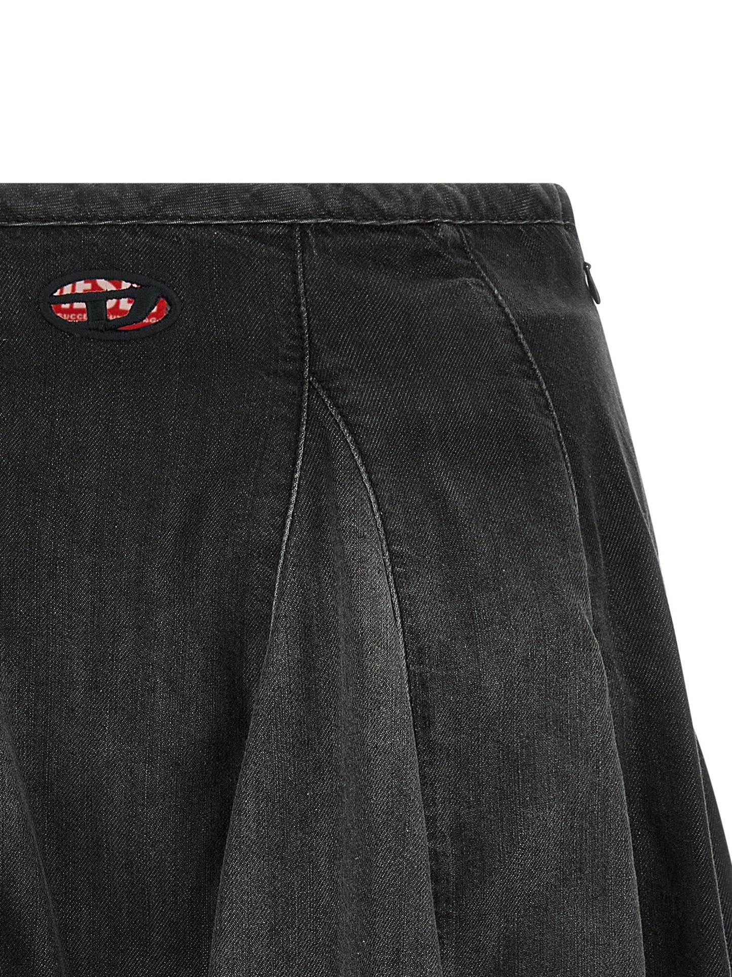 Skirt by Diesel for women in lyocell & cotton black features a contoured silhouette from the Women's Pleated Lyocell & Cotton Mini Long Skirt collection, characterized by its contoured mini long for a contoured finish.