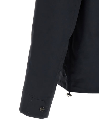Windbreaker Jacket by Herno for men in stretch polyamide blue & signature presents a resilient silhouette, artfully detailed with a sophisticated shirt-collar neckline and functional pockets & windproof for a resilient finish.