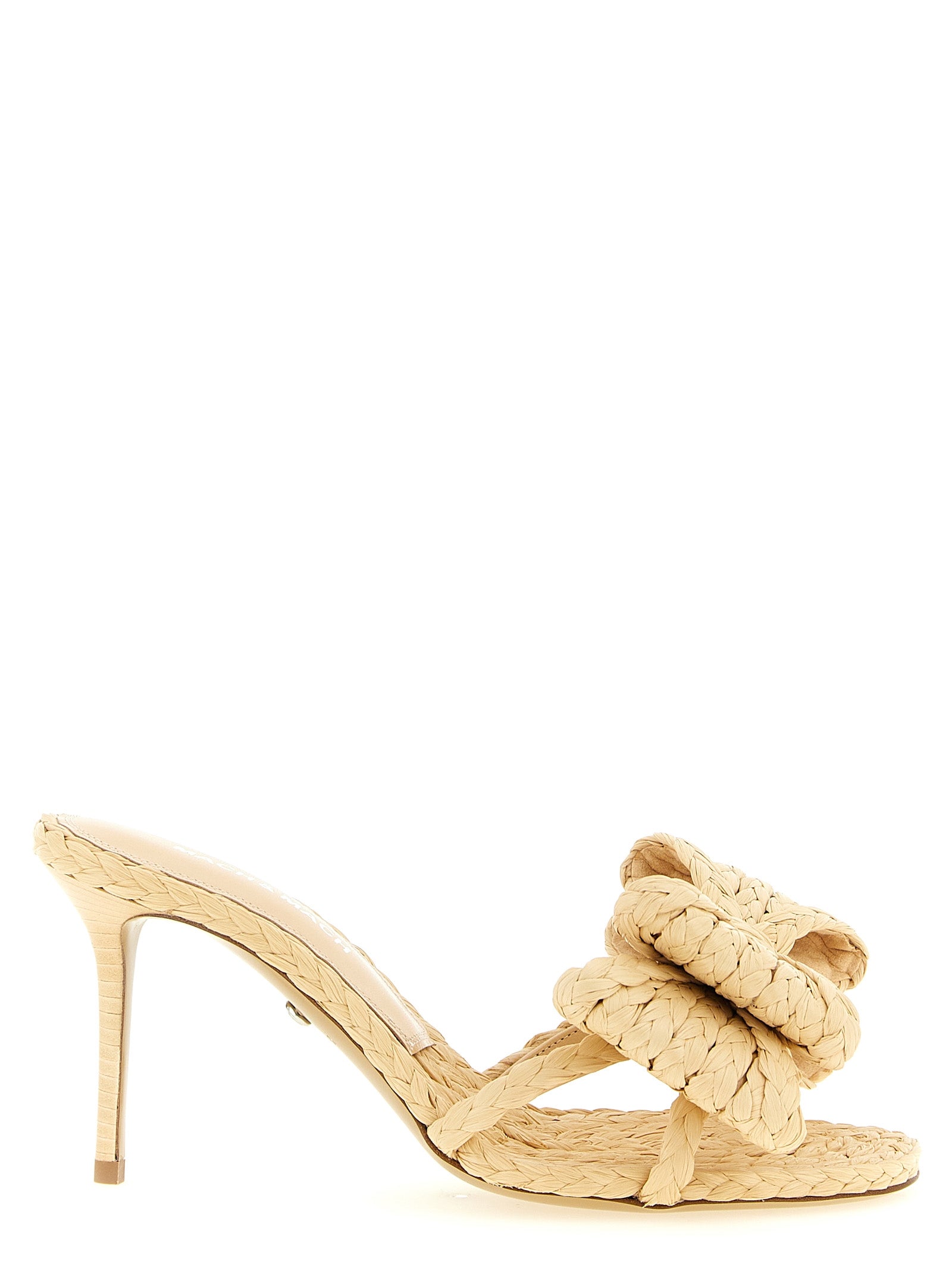 Stiletto Mules Sandals by MACH & MACH for women in leather & raffia beige showcases a sculptural silhouette as Women's Leather & Raffia Stiletto Mules Sandals, defined by a sculptural stiletto and sculptural for a sculptural look.