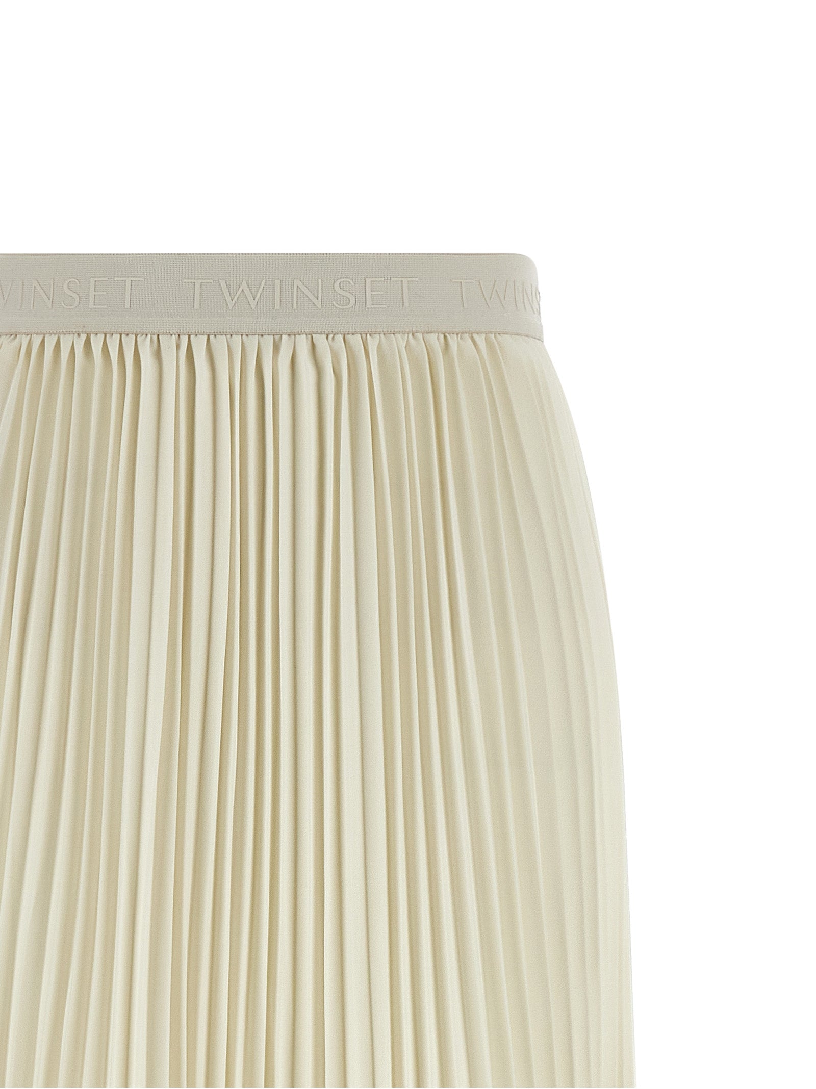Skirt by Twinset for women in polyester white features an relaxed-yet-refined silhouette that elegantly showcases the Women's Pleated Polyester Mini Skirt design and sophisticated mini.