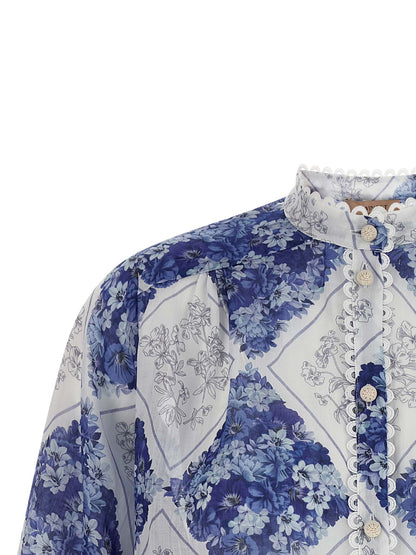 Blouse by Twinset for women in ramie & leather blue, patterned, floral & print features an architectural silhouette with a refined and elegant mandarin neckline for a architectural look.