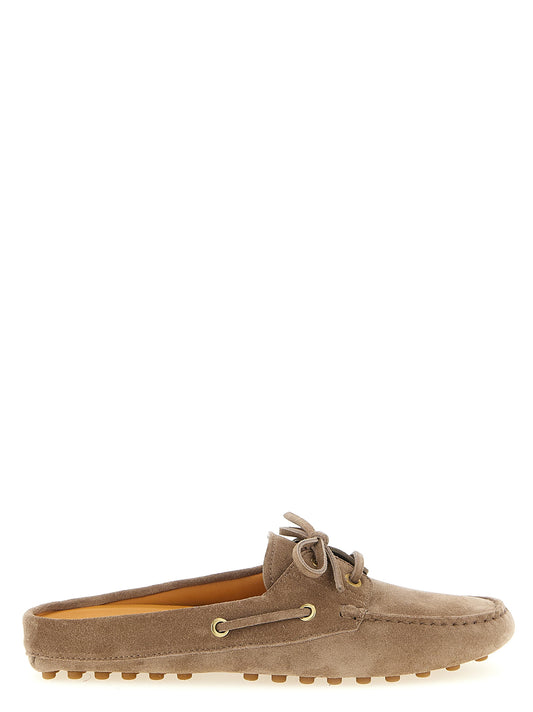 Boat Flat Shoes by Tod's for women in suede calfskin leather beige features an statuesque silhouette from the Women's Suede Calfskin Leather Boat Flat Shoes collection, showcasing a and a statuesque for a statuesque look.