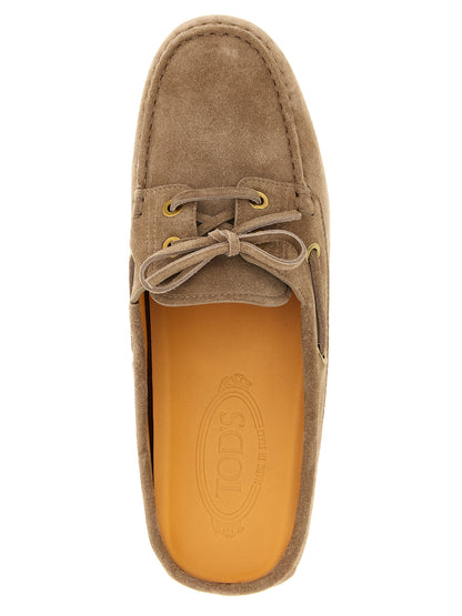 Boat Flat Shoes by Tod's for women in suede calfskin leather beige showcases a enchanting silhouette as part of the Women's Suede Calfskin Leather Boat Flat Shoes collection, defined by a enchanting and for a enchanting look.