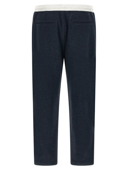 Joggers by Brunello Cucinelli for men in linen & cotton blue features a refined silhouette with a refined , defined by a and a refined long for a refined finish.