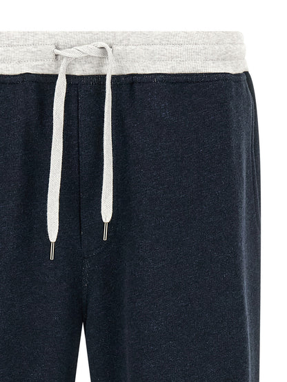 Joggers by Brunello Cucinelli for men in linen & cotton blue features an sartorial and long with a cut for a sartorial finish.