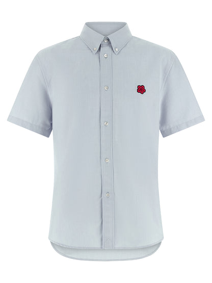 Shirt by Kenzo for men in cotton light-blue presents a discerning silhouette, showcasing a sophisticated and for a truly discerning finish.